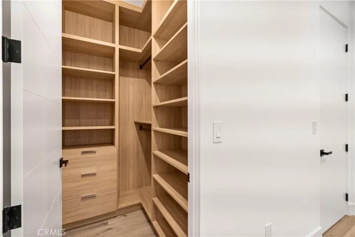Mini Walk-in Closet in Bedroo,