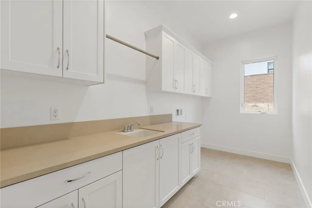 Laundry Room: Saddleback Italianate - Ridge Collection at Bella Vista - Photo of another Saddleback -  Not actual home for sale - Home is still under construction - Estimated delivery of September 2026