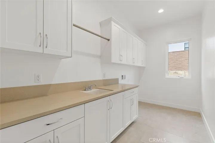 Laundry Room: Saddleback Italianate - Ridge Collection at Bella Vista - Photo of another Saddleback -  Not actual home for sale - Home is still under construction - Estimated delivery of September 2026