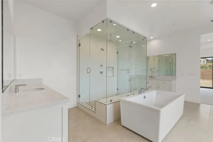 Primary Bathroom: Saddleback Italianate - Ridge Collection at Bella Vista - Photo of another Saddleback -  Not actual home for sale - Home is still under construction - Estimated delivery of September 2026
