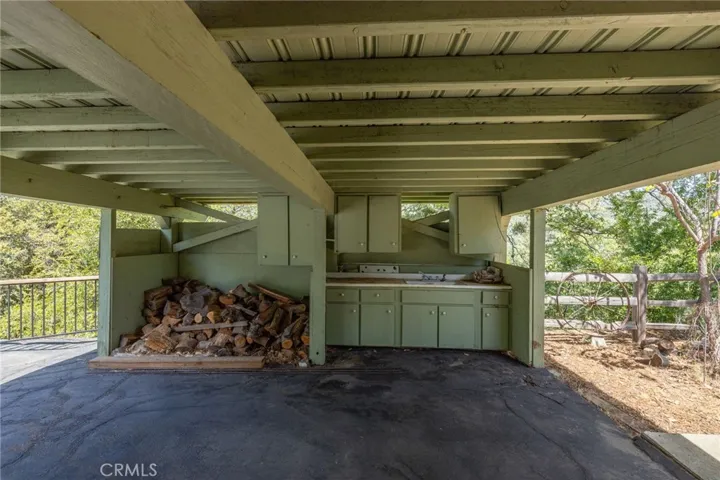 Outdoor kitchen- wood storage