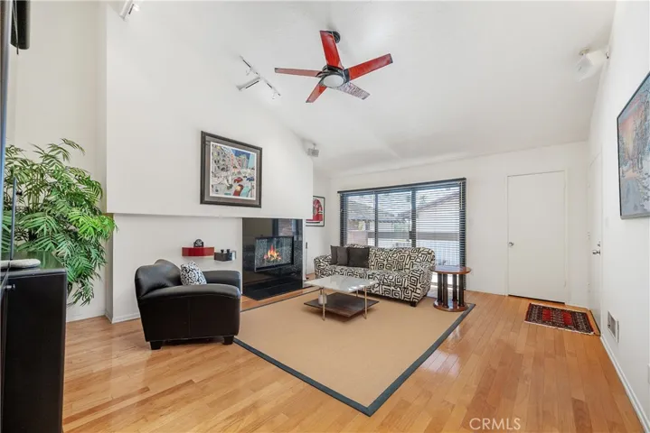 A very spacious living area with a peek-a-boo ocean view.

(simulated fire)