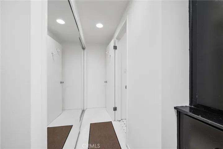 Mirrored wardrobe in the Primary dressing area.