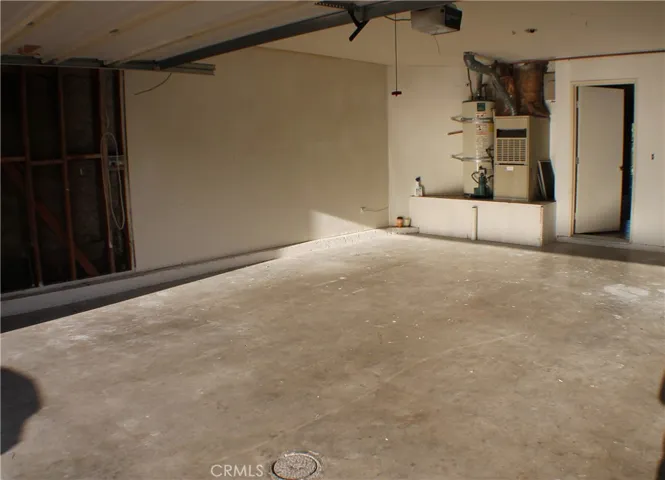 LARGE TWO CAR GARAGE - BEFORE WHEN EMPTY