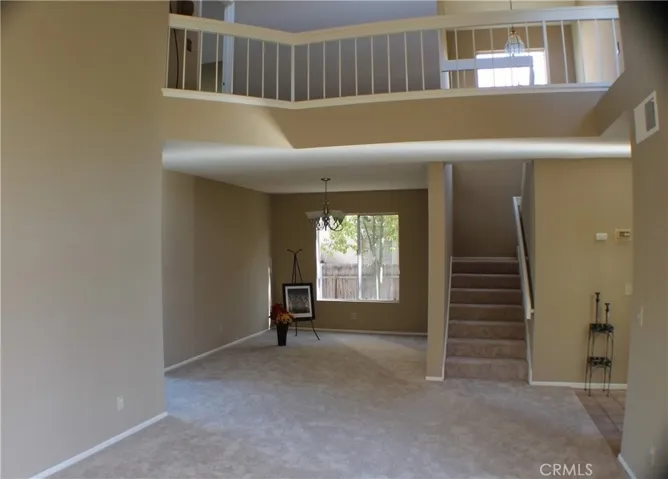 DINING AREA AND STAIRS TO UPSTAIRS ALL BEDROOMS.