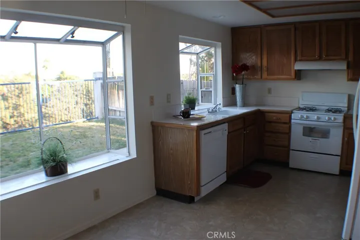 KITCHEN WHEN EMPTY - HAS TWO BAY WINDOWS