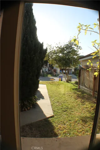 VIEW FROM FRONT WINDOW DOWN PATHWAY TO STREET
