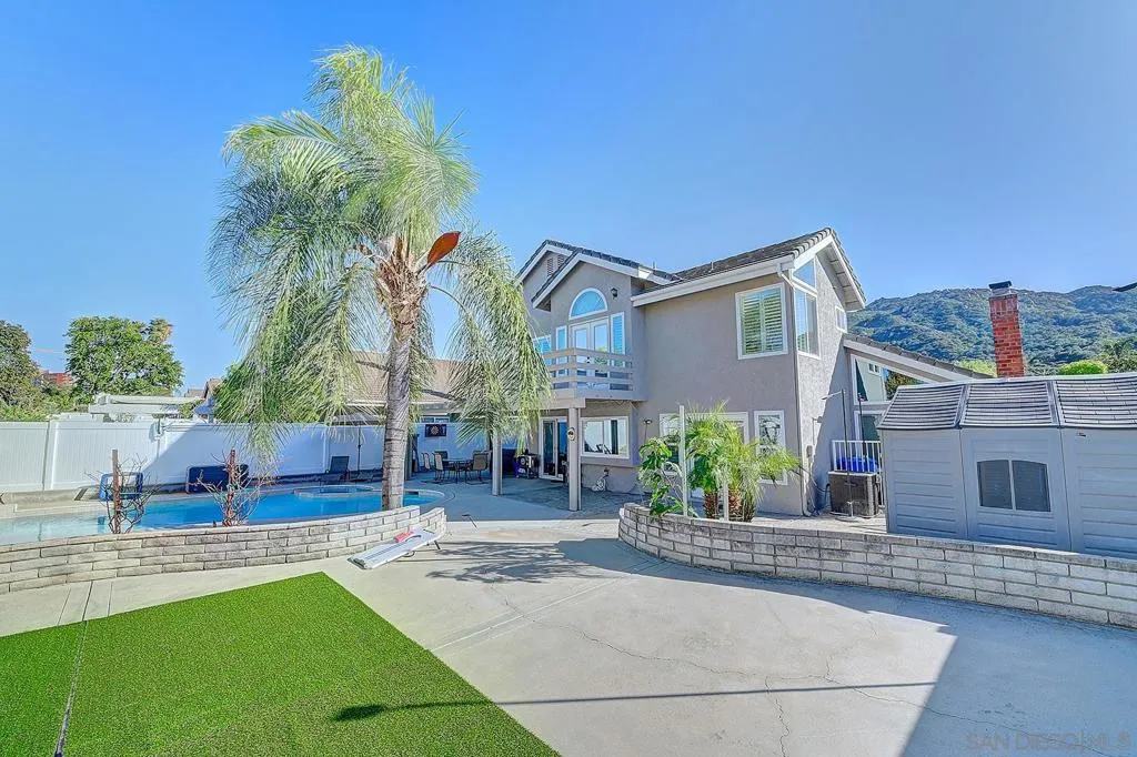 The backyard that started the conversation. Pool, spa, turf lawn, palms, tiered hardscape, and breathtaking mountain views — fully enclosed with new vinyl fencing and ready for your next chapter.
