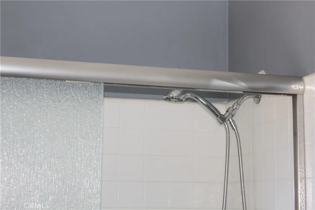 COVERED SHOWER GLASS DOORS