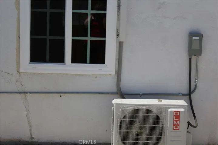 A/C UNIT IN BACK YARD