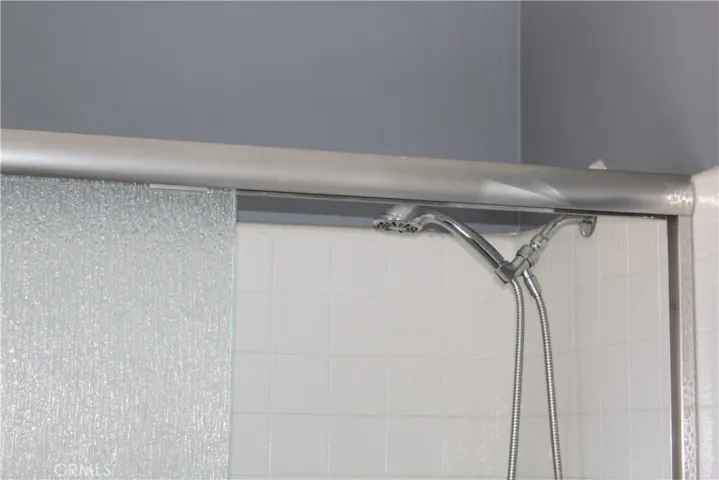 COVERED SHOWER GLASS DOORS
