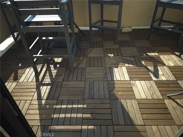FLOORING UPSTAIRS PATIO