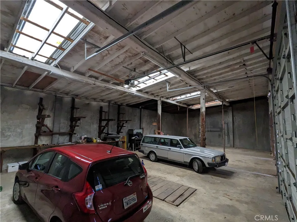 inside separate garage with pit