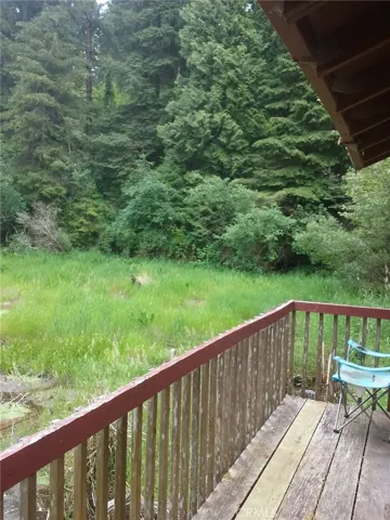 Deck by the cabin pond