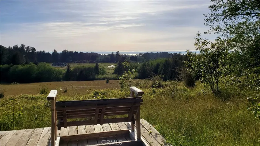 Ocean view from top of the 67 acreproperty. see the horse stables and green house