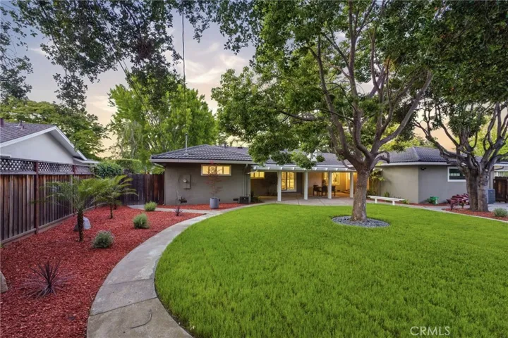 Beautifully landscaped backyard retreat.