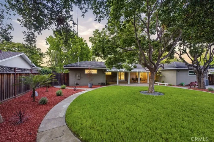 Beautifully landscaped backyard retreat.