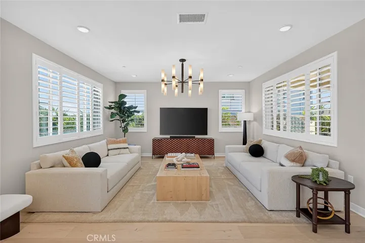 Formal living room complete with wood shutters