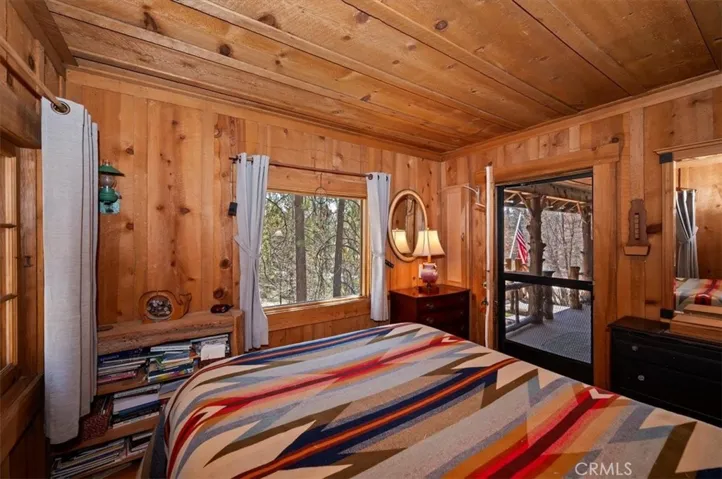 Bedroom with forest views