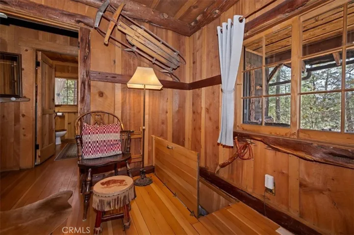 Access to lower rooms through the living room,