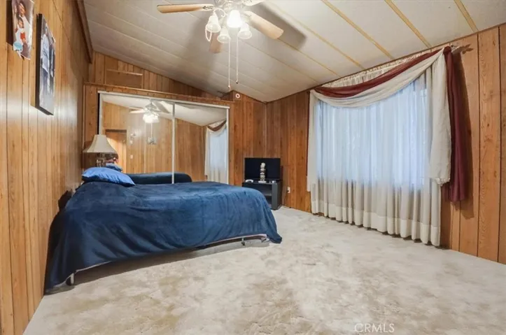 2nd bedroom with mirrored closet doors