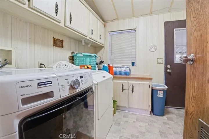 Laundry room/storage area directly off entrance.