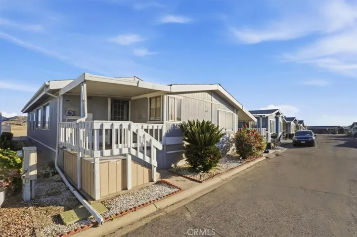 Formal entry to living space via stairs.