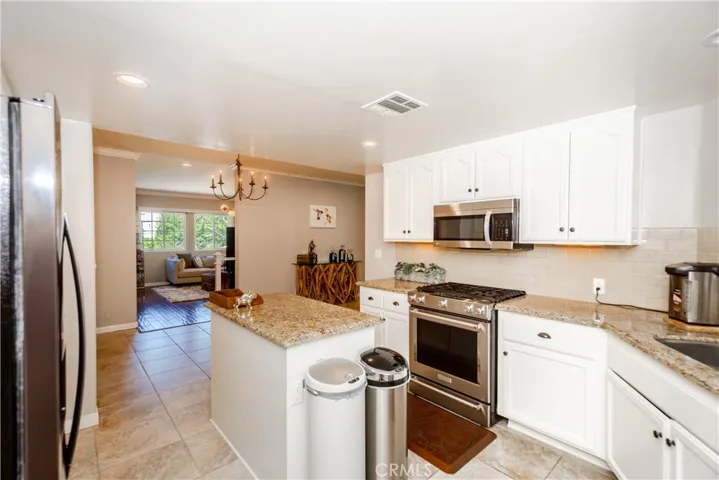 Seamless connection between kitchen, dining and living areas-modern open-concept living at its best.