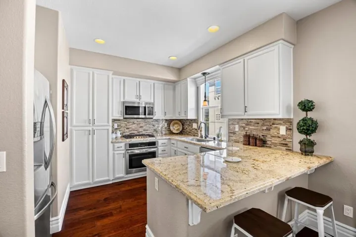 well appointed kitchen receives lots of natural light