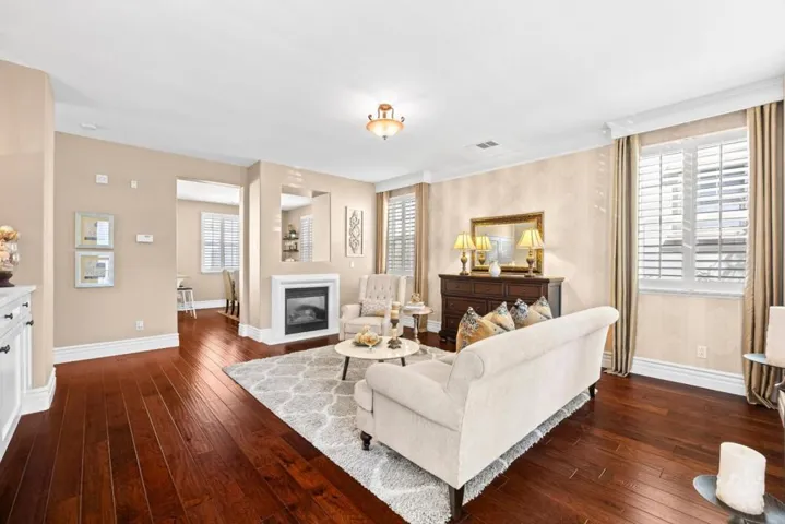 engineered hardwood flooring with high baseboards adds a luxury feel to the home