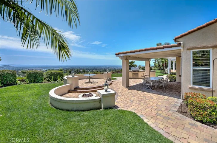 Backyard with Pavers, firepit and BBQ area