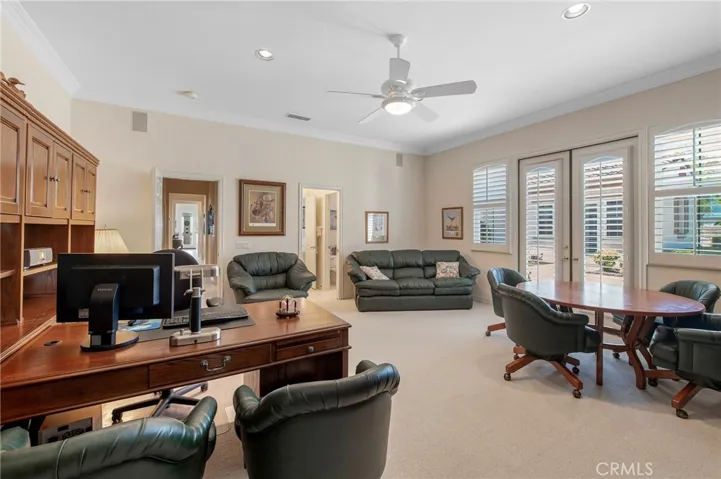 Bonus Room with Ceiling Fan & Courtyard Access.