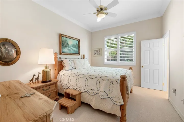 Secondary En Suite Bedroom with Ceiling Fan & Walk in Closet