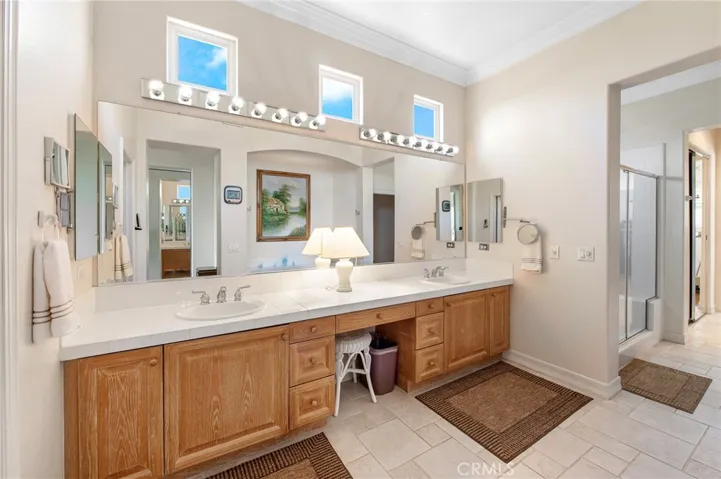 Bath with Dual Sinks and another walk in Closet