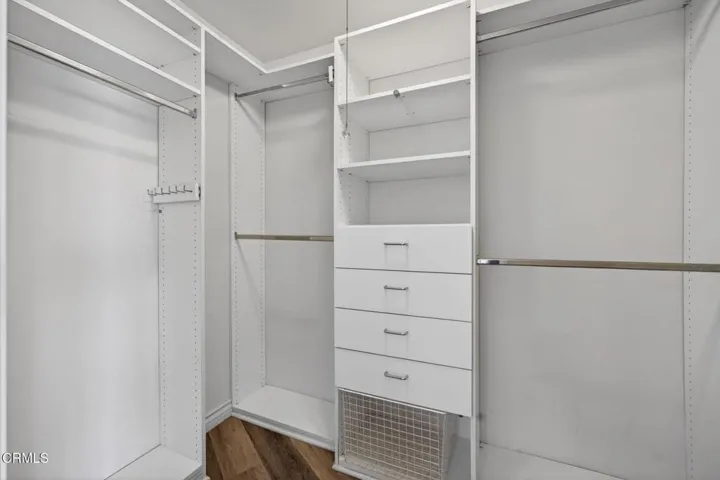 Primary walk in closet & built ins