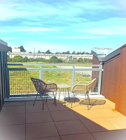 Private third-floor patio facing west. Perfect for sunsets, quiet time, and BBQ's.