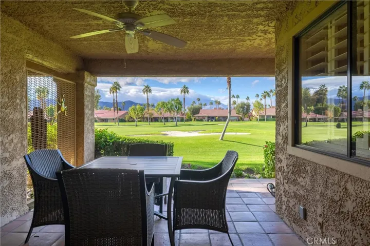 Patio off the dining area - new ceiling fan/light replaced this one