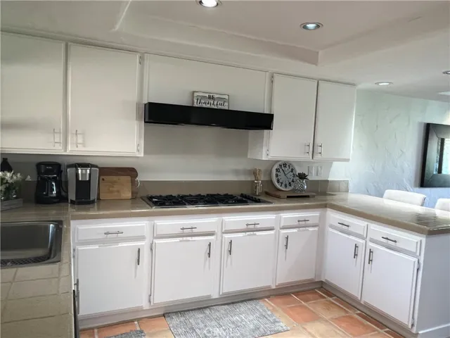 Fully equipped kitchen with gas stove