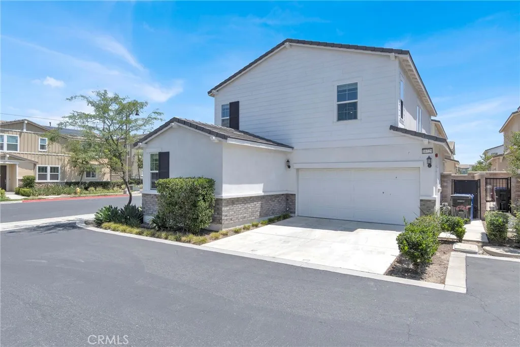 Attached car garage with 2 extra driveway parking