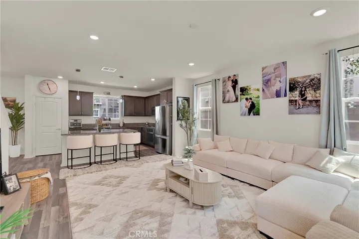 living room opens to kitchen