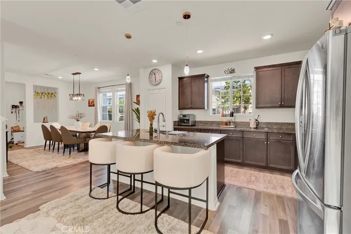 Openfloor plan formal dining room with kitchen