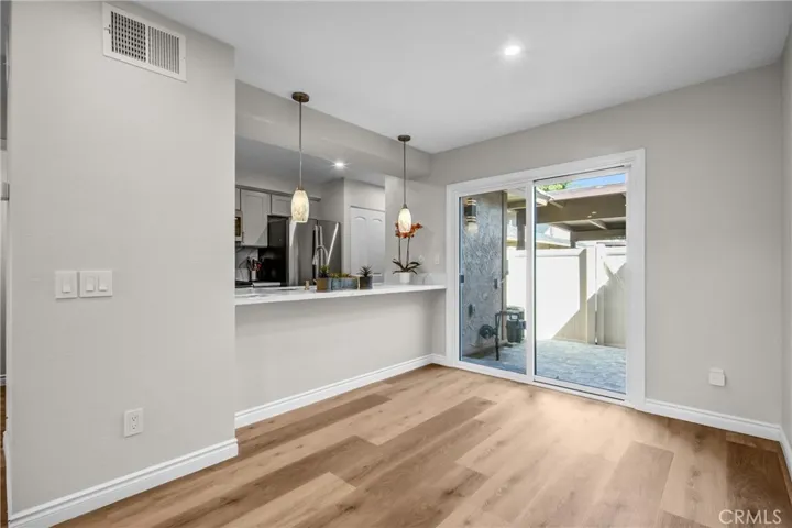 Dinning  Area Kitchen/Bar
Sliding Door to Patio