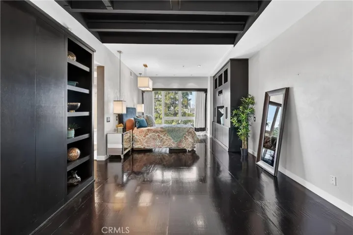 Stunning primary suite with custom built ins