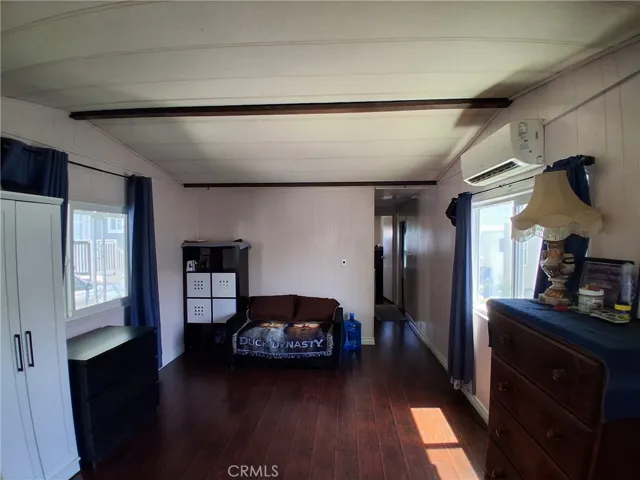 Open-Concept Living Room Equipped with Mini-Split A/C System.