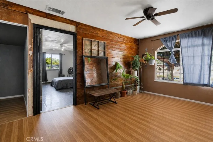 AI-Altered Version – AI was used to remove clutter and furniture.