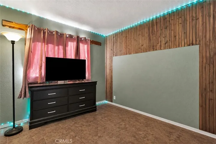 AI-Altered Version – AI was used to remove clutter and furniture.