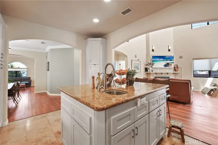 Formal to the left; Family to the right.  The kitchen is the heart of the home!