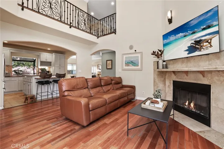 Family room with view of the kitchen.