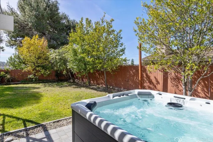 Backyard, above-ground spa.