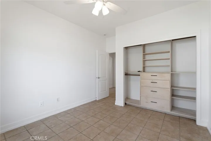 Front Bedroom #1 with custom shelving in side the closet